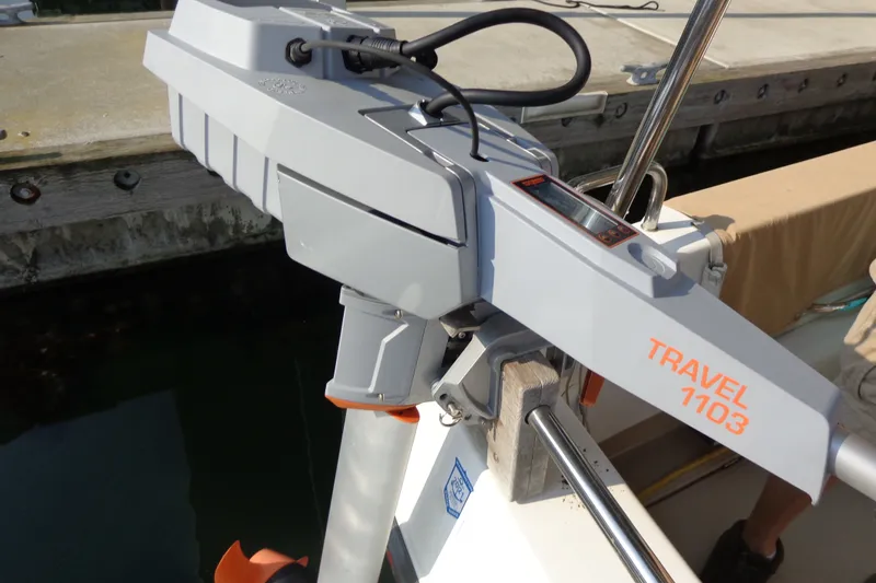 Slide: The Image of Electric outboard motor on 2016 Ranger Tugs R-31 S boat docked at marina. - 59