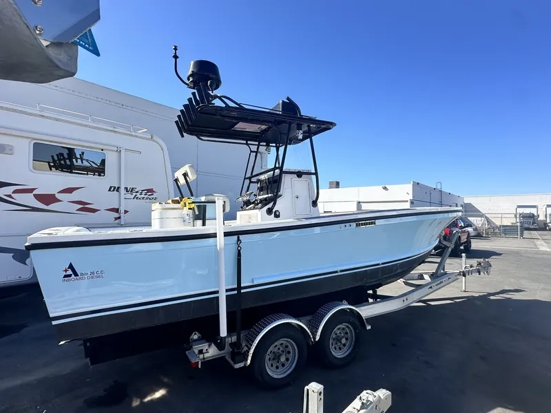 Slide: The Image of A 2006 Albin 26 Center Console boat on a trailer, ready for transport. - 3