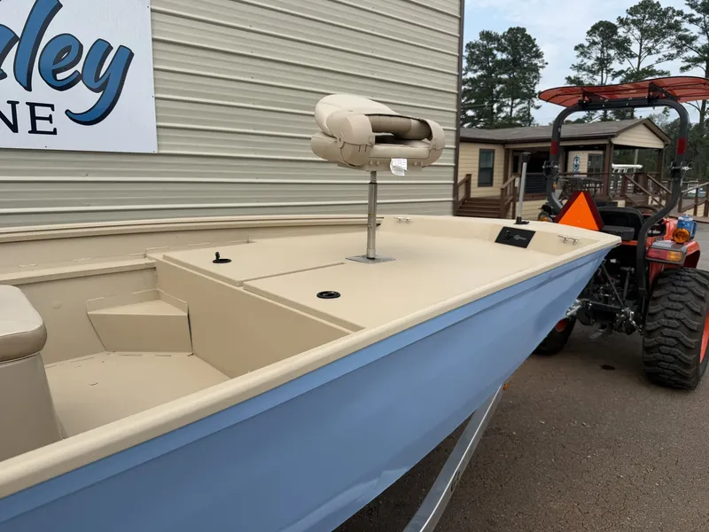 Slide: The Image of A 2026 G3 Bay 18 BAY-90SHO boat on a trailer next to a building. - 4