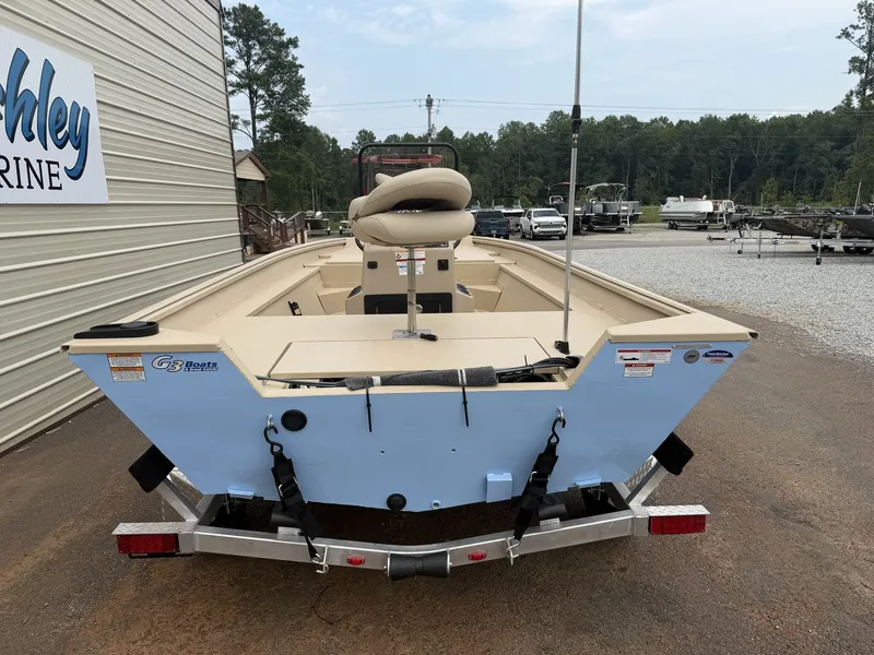 Slide: The Image of A 2026 G3 Bay 18 BAY-90SHO boat on a trailer in an outdoor area. - 6