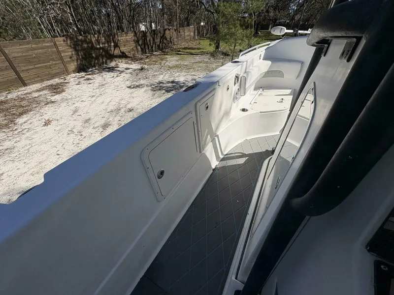 Slide: The Image of The image shows the deck of a 2008 Wellcraft 35 Scarab Sport. It is clean and spacious. - 40