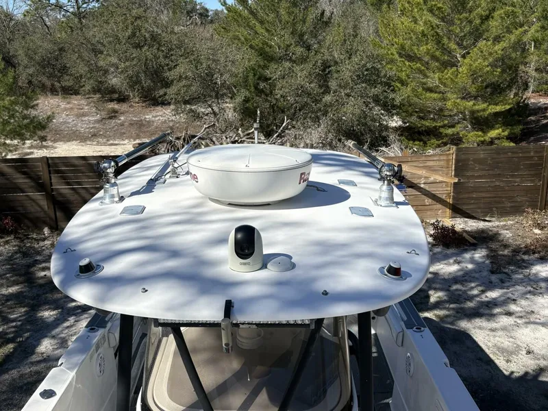 Slide: The Image of A 2008 Wellcraft 35 Scarab Sport with a spacious deck and modern electronics. - 12