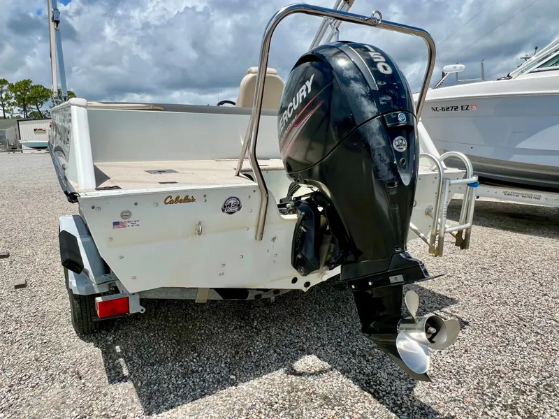 Slide: The Image of The image shows a 2016 Lowe Sport Deck 224 boat with a Mercury outboard motor. - 9