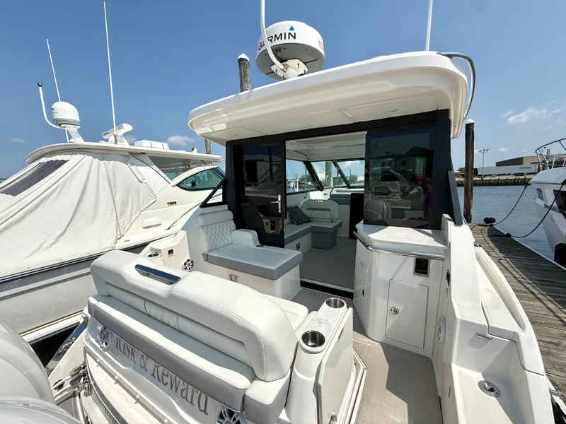 Slide: The Image of The 2023 Regal 36 XO features a sleek, modern design with a spacious cockpit and luxurious amenities. - 6
