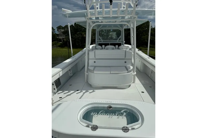 Slide: The Image of 2024 Yellowfin 39 Offshore boat interior with seating and storage, showcasing sleek design. - 3