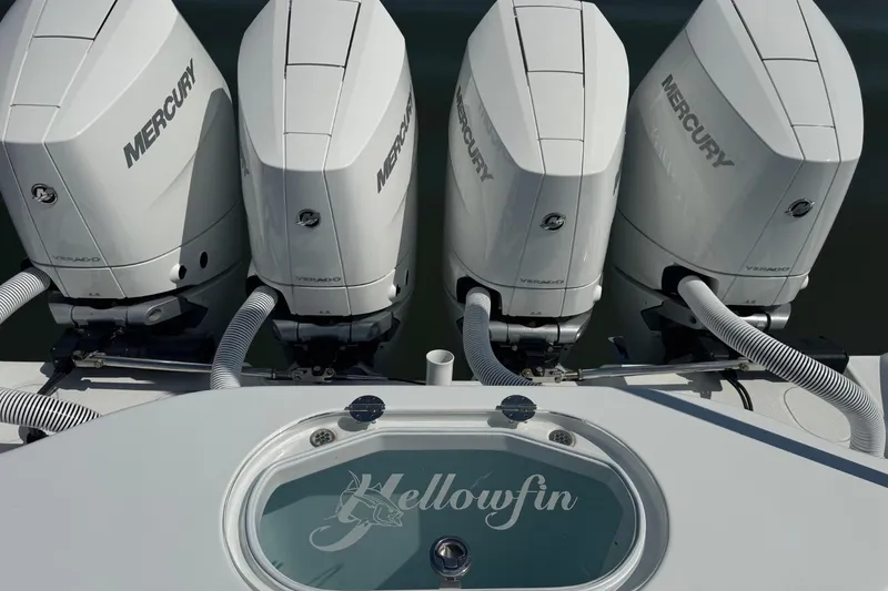 Slide: The Image of 2024 Yellowfin 39 Offshore boat with four Mercury Verado engines, rear view. - 7