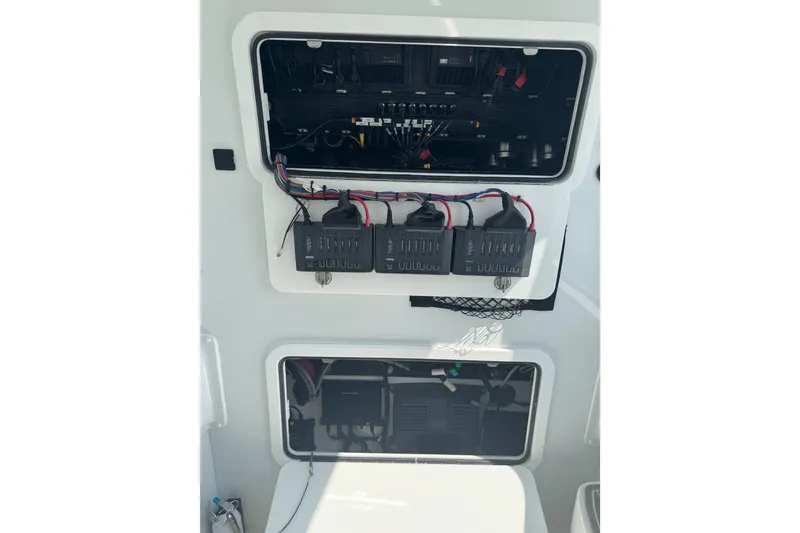 Slide: The Image of Electrical panel of 2024 Yellowfin 39 Offshore boat, showcasing wiring and components. - 10