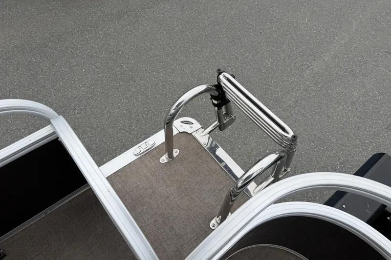 Slide: The Image of 2021 Ranger Reata 223FC boat ladder and deck detail on a textured surface. - 23