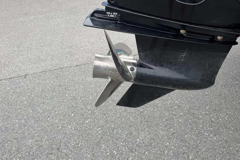 Slide: The Image of Propeller of 2021 Ranger Reata 223FC boat on pavement background. - 6