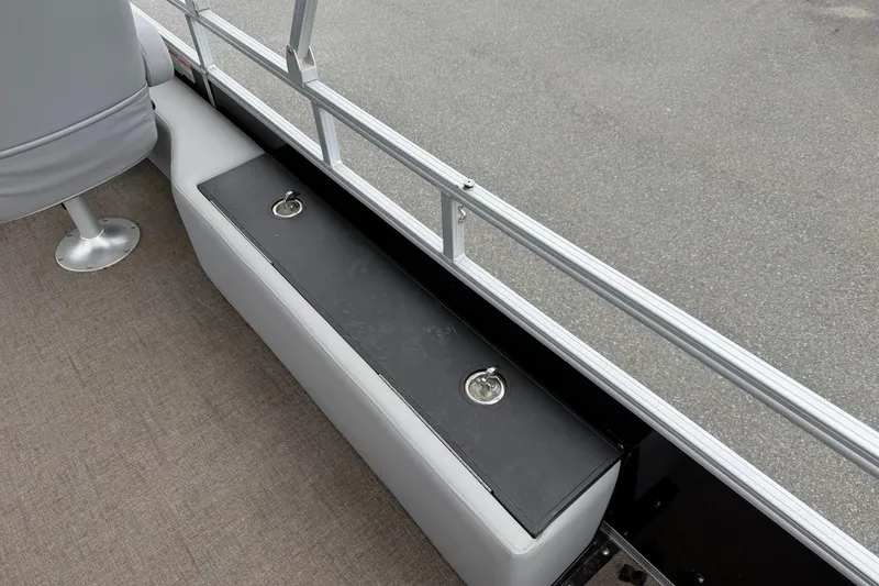 Slide: The Image of Interior view of 2021 Ranger Reata 223FC boat, featuring seating and storage. - 24