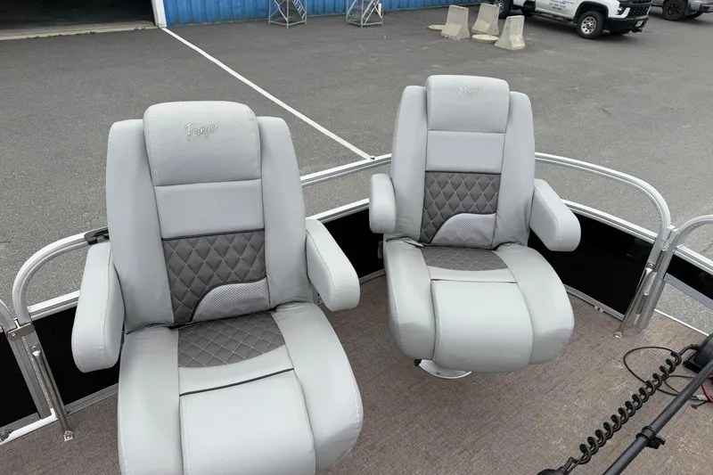 Slide: The Image of 2021 Ranger Reata 223FC boat seats with gray upholstery and diamond stitching. - 22