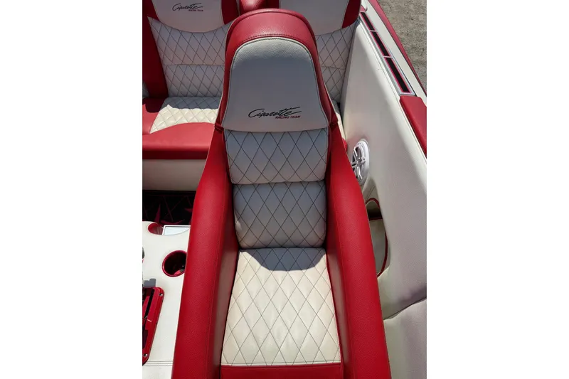 Slide: The Image of Red and white leather seat of a 2003 Cigarette 36' Gladiator boat. - 28