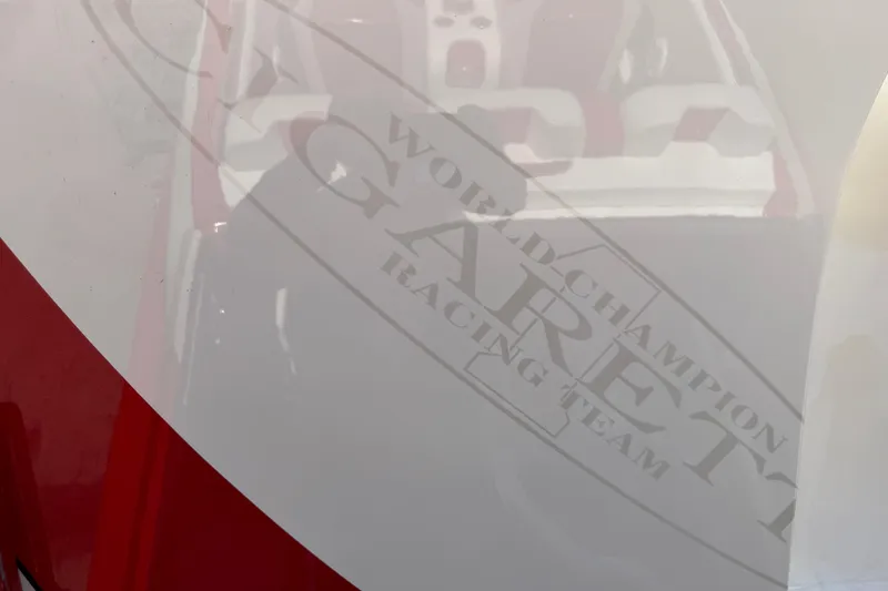 Slide: The Image of 2003 Cigarette 36' Gladiator boat with "World Champion Racing Team" decal. - 44