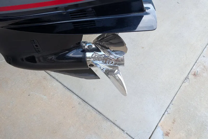 Slide: The Image of 2021 Pathfinder 2200 TRS boat propeller on concrete surface. - 9