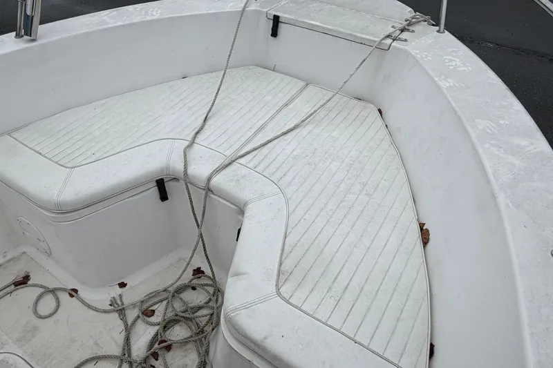 Slide: The Image of Interior view of a 2006 Seahunt 207 Triton boat with seating and ropes. - 4