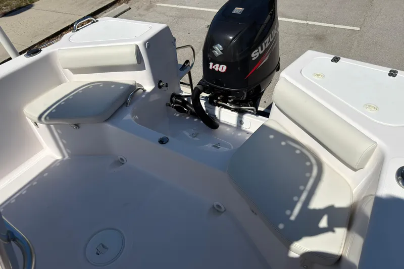 Slide: The Image of 2016 Pro-Line 20 Sport boat interior with Suzuki 140 outboard motor. - 12