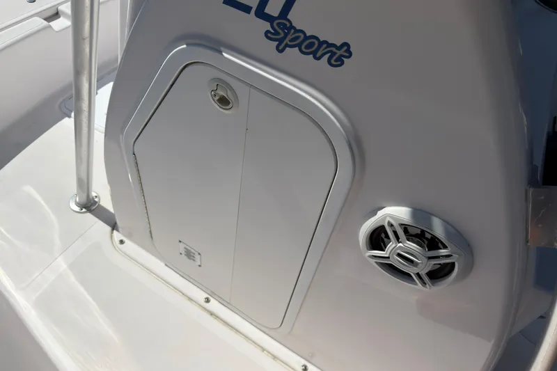 Slide: The Image of 2016 Pro-Line 20 Sport boat console with storage compartment and speaker. - 23