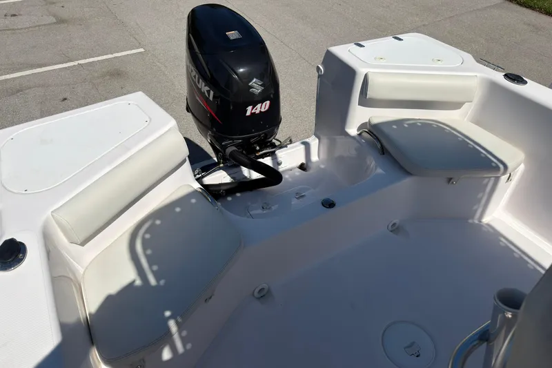 Slide: The Image of 2016 Pro-Line 20 Sport boat interior with Suzuki 140 outboard motor. - 11