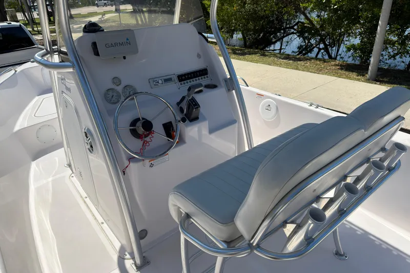 Slide: The Image of 2016 Pro-Line 20 Sport boat interior with Garmin navigation and sleek seating. - 14
