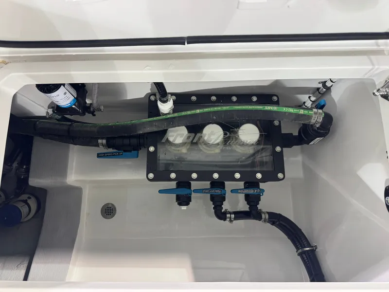 Slide: The Image of A technical area of a boat with hoses and valves. - 19