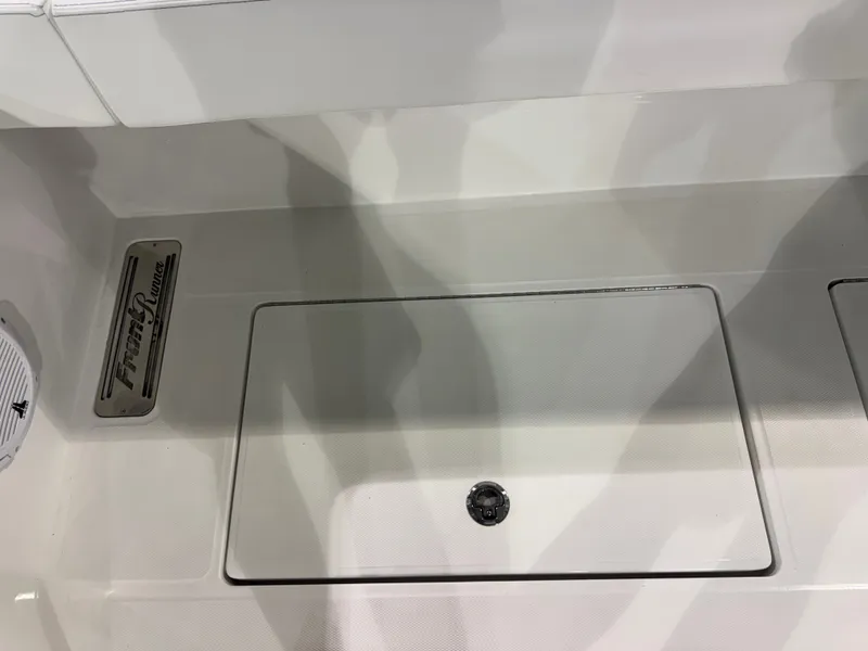 Slide: The Image of The image shows a boat floor with a recessed compartment and a Front Runner logo. - 17