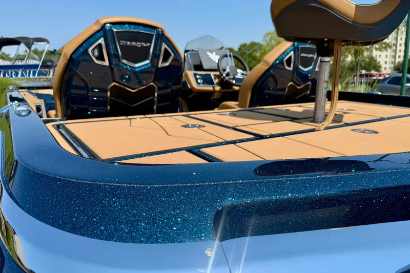 Slide: The Image of 2026 Ranger Z520R Ultra boat with sparkling blue finish and tan interior. - 14