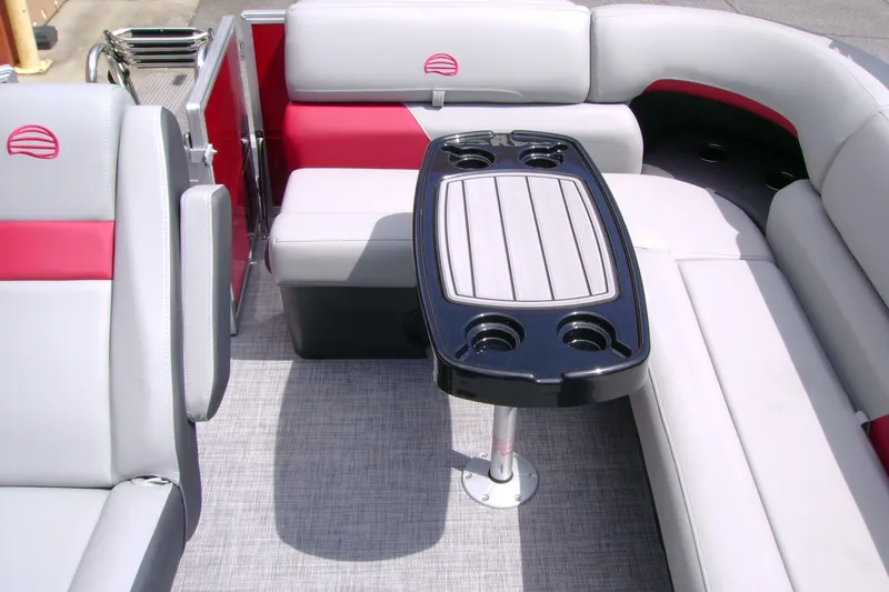 Slide: The Image of Interior of 2026 Sun Tracker Party Barge 20 DLX with seating and table. - 14