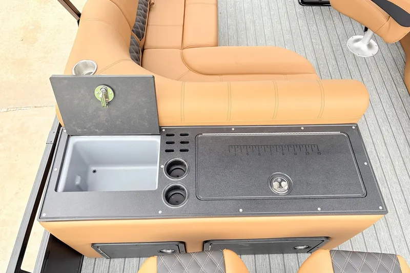 Slide: The Image of Luxurious seating and utility area on 2026 Ranger 223FC boat. - 40