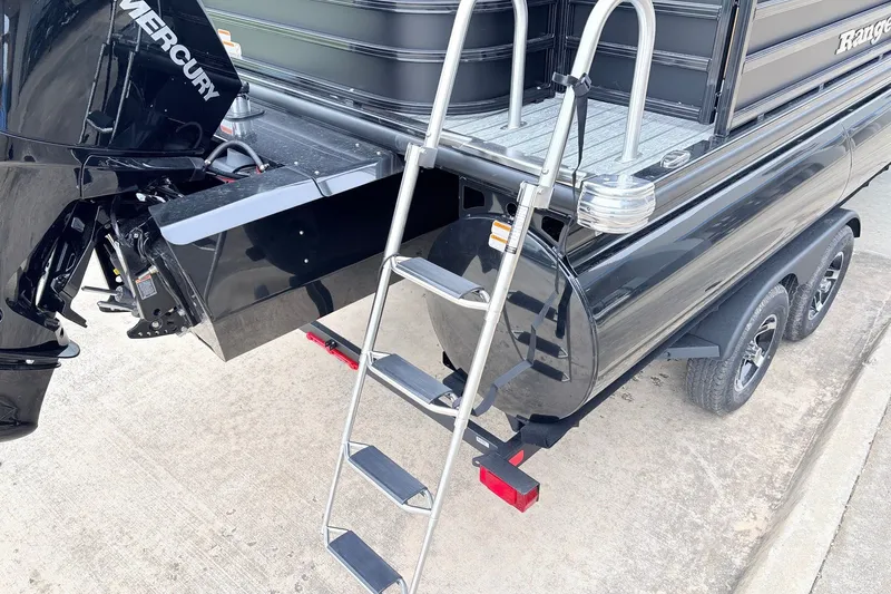 Slide: The Image of 2026 Ranger 223FC boat with Mercury engine and ladder on a trailer. - 9