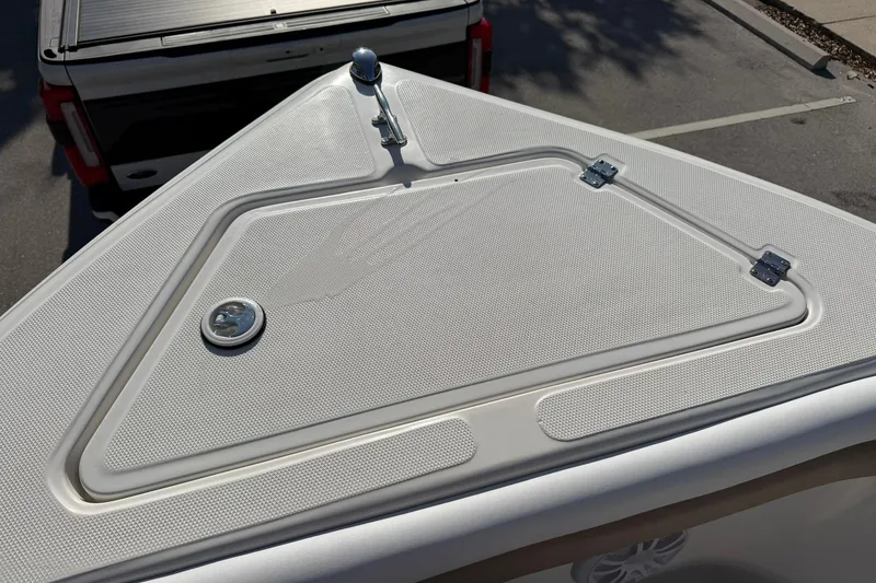 Slide: The Image of Bow of 2011 Sea Fox 216 Dual Console boat with storage hatch. - 17