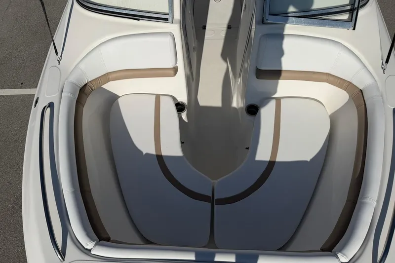 Slide: The Image of 2011 Sea Fox 216 Dual Console boat interior with cushioned seating and open deck layout. - 18