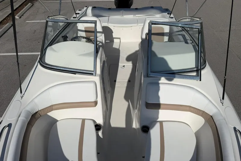 Slide: The Image of 2011 Sea Fox 216 Dual Console boat interior with open windshield and seating. - 19