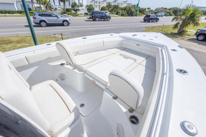 Slide: The Image of 2022 Sea Hunt Gamefish 27 boat with spacious seating and modern design. - 26