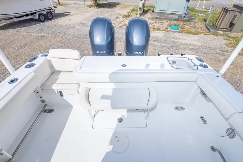 Slide: The Image of 2022 Sea Hunt Gamefish 27 boat interior with dual 200 horsepower engines. - 35