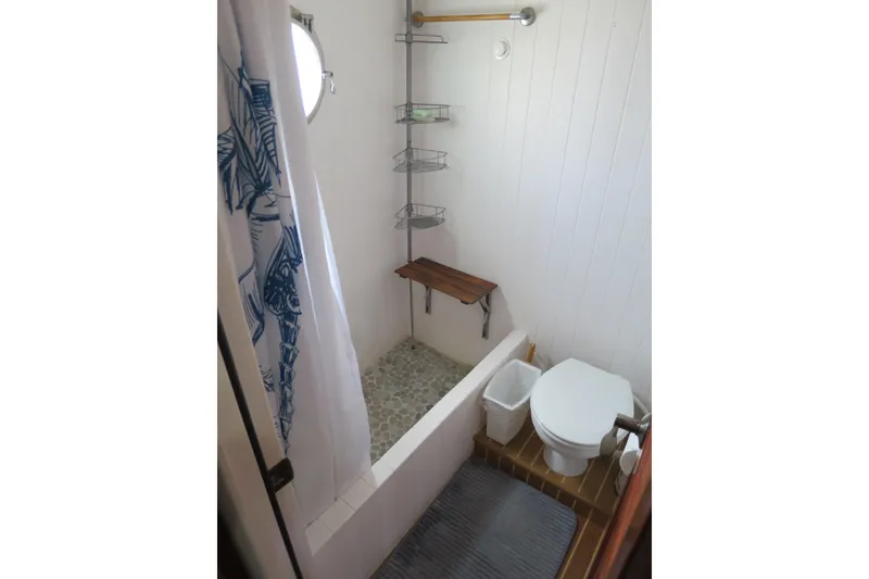 Slide: The Image of Bathroom interior of 2007 Grand Harbour N47 yacht with shower and toilet. - 22