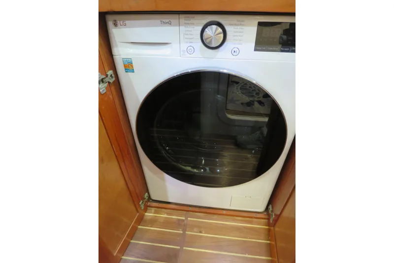 Slide: The Image of LG ThinQ washer in wooden cabinet on 2007 Grand Harbour N47 yacht. - 27