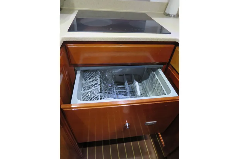 Slide: The Image of Built-in dishwasher in 2007 Grand Harbour N47 yacht kitchen. - 29