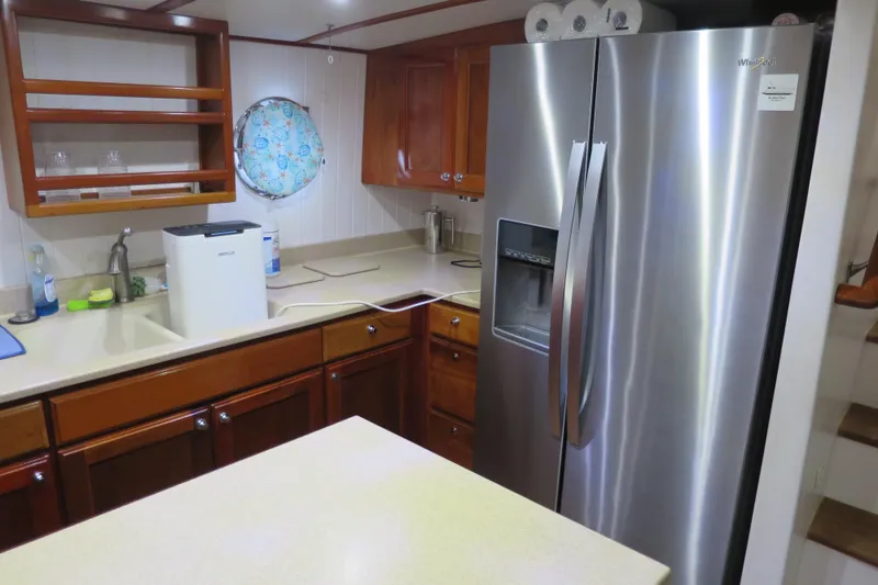 Slide: The Image of Modern kitchen in 2007 Grand Harbour N47 yacht with stainless steel appliances. - 32