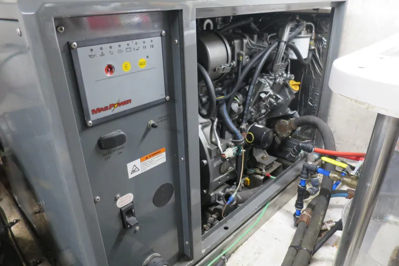 Slide: The Image of Engine compartment of a 2007 Grand Harbour N47 yacht, featuring Mas Power generator. - 3
