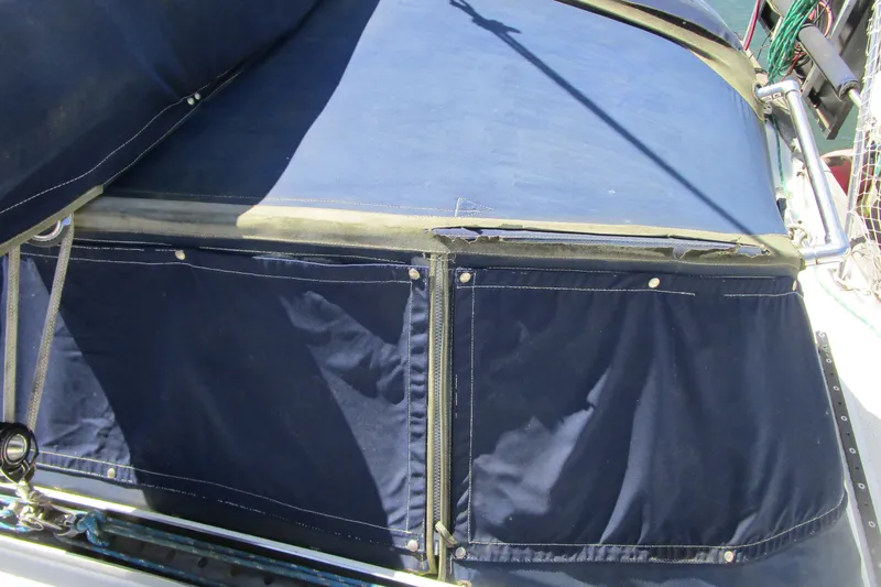 Slide: The Image of Blue canvas cover on a 1980 Passport 40 sailboat deck. - 10