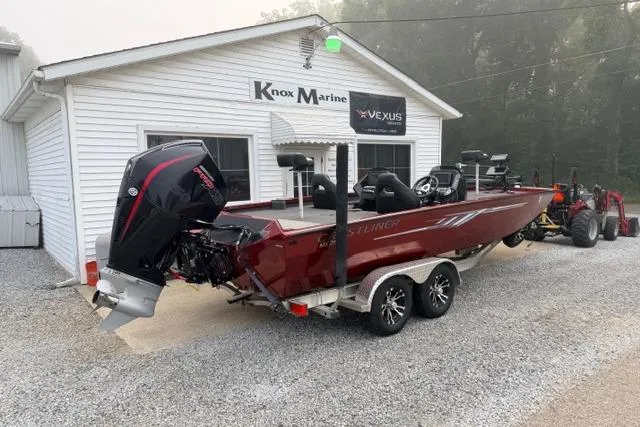 Slide: The Image of 2022 Crestliner MX 21 boat parked outside Knox Marine dealership. - 2