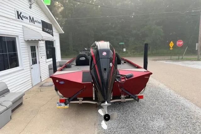 Slide: The Image of 2022 Crestliner MX 21 boat parked outside Knox Marine, rear view. - 4