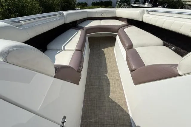 Slide: The Image of 2012 Cobalt 276 boat interior with spacious seating and elegant design. - 23