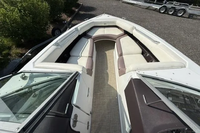 Slide: The Image of 2012 Cobalt 276 boat interior with spacious seating and modern design. - 22