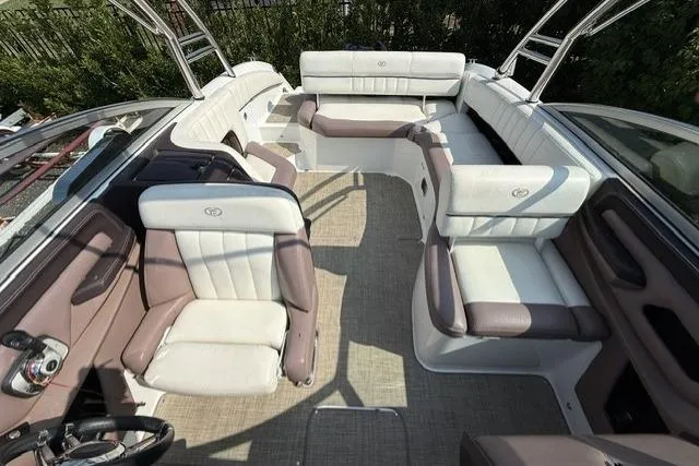 Slide: The Image of 2012 Cobalt 276 boat interior with plush seating and modern design. - 24