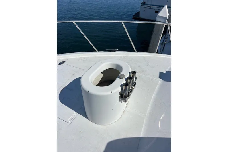 Slide: The Image of Fishing rod holders on deck of 1994 Mikelson 64 yacht, ocean view. - 38