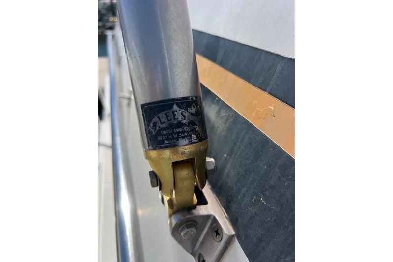 Slide: The Image of Close-up of a 1994 Mikelson 64 boat fitting with "Lee's" label. - 41