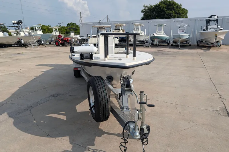 Slide: The Image of 2021 Maverick 18 HPX-V boat on trailer in a marina parking lot. - 3