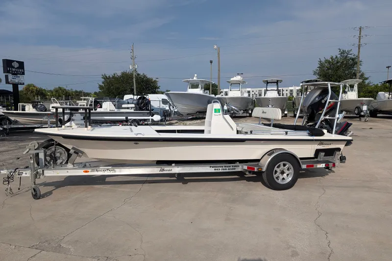 Slide: The Image of 2021 Maverick 18 HPX-V boat on trailer in outdoor dealership lot. - 5