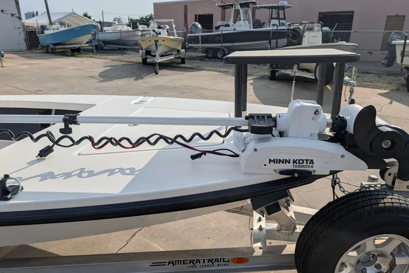 Slide: The Image of 2021 Maverick 18 HPX-V boat with Minn Kota Terrova trolling motor on trailer. - 19